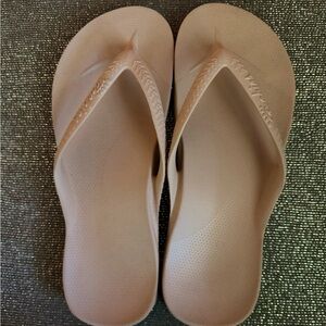 Archie’s flip flops